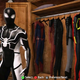 Illustration for article titled A Celebration of Superheroes Staring at Costumes in Fancy Display Cases